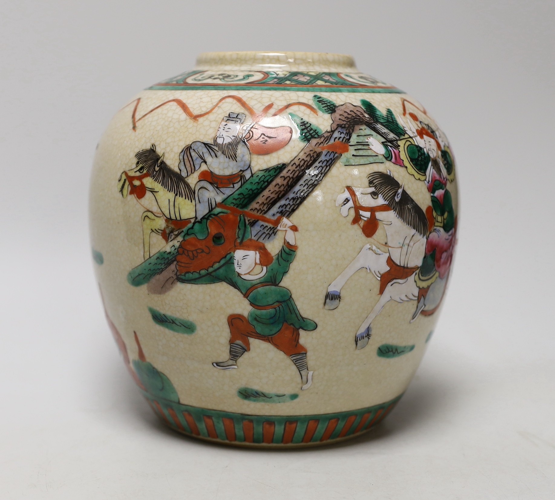 An early 20th century Chinese famille rose crackle glaze ginger jar, decorated with warrior scenes, 18cm high
